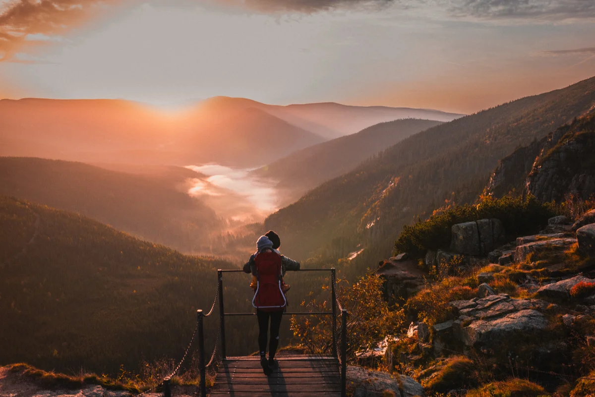 tourist lost in autumn fog krkonose
