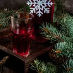 homemade autumn fruit syrup on wooden table