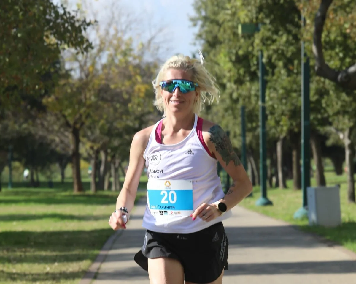 determined runner running sunrise Prague park personal record