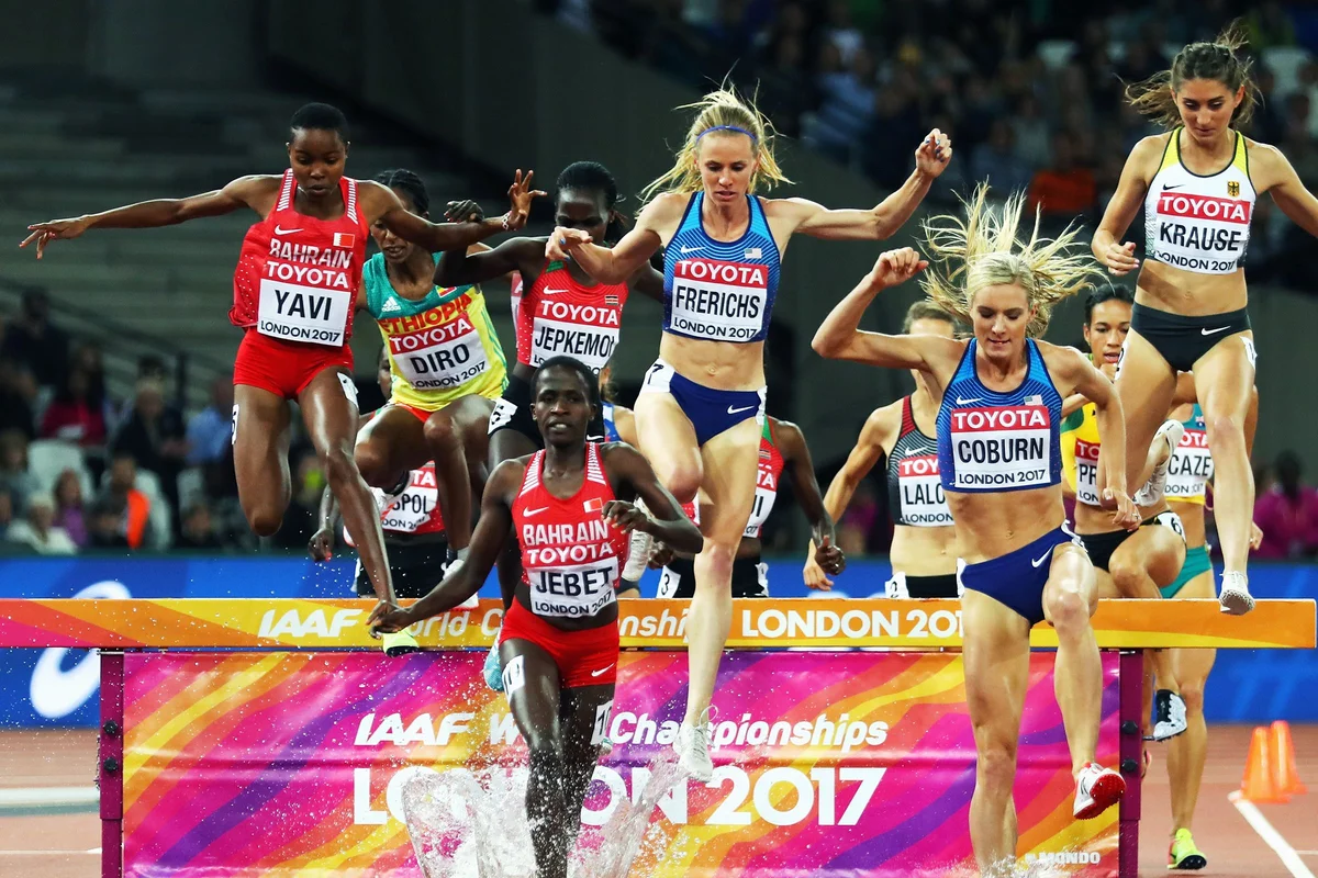 elite athlete exhausted summer heat track running