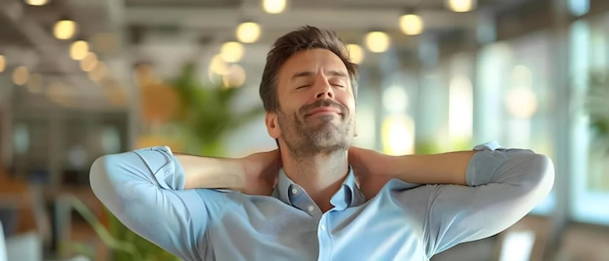 man stretching neck office stress relief