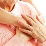 close up human comforting touch oxytocin relaxation