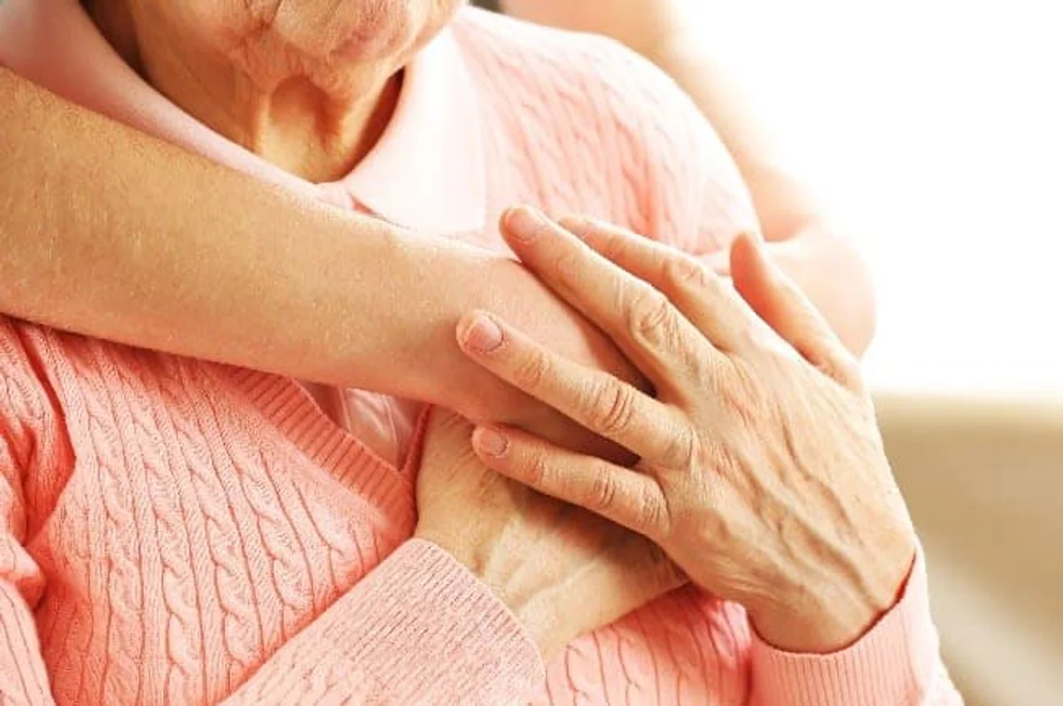 close up human comforting touch oxytocin relaxation