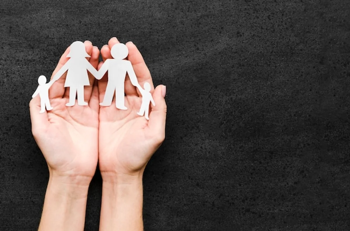 european family using laptop at home looking secure autumn