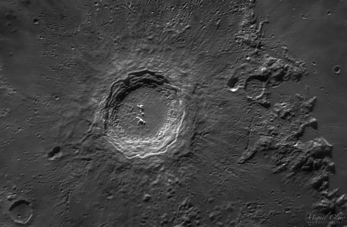 detail moon craters seen through telescope czech night sky