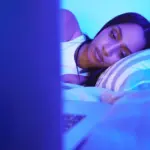 bedroom smartphone blue light person sleep insomnia