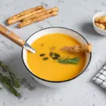 quick pumpkin soup homemade top view rustic style
