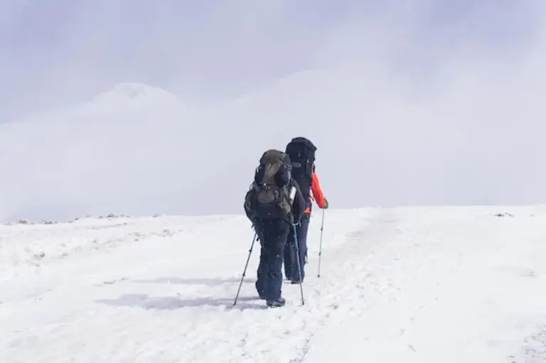 hiking in stormy weather in Czech mountains