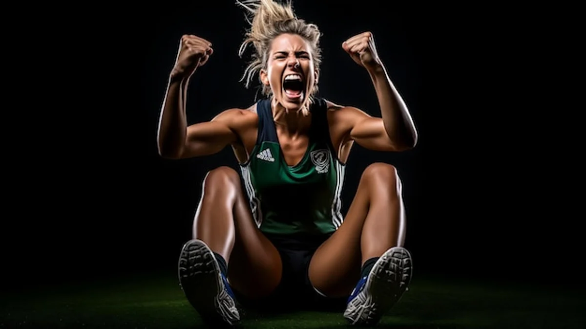 athlete intense focus track and field stadium emotion