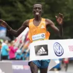 Czech marathon athlete running rain victory