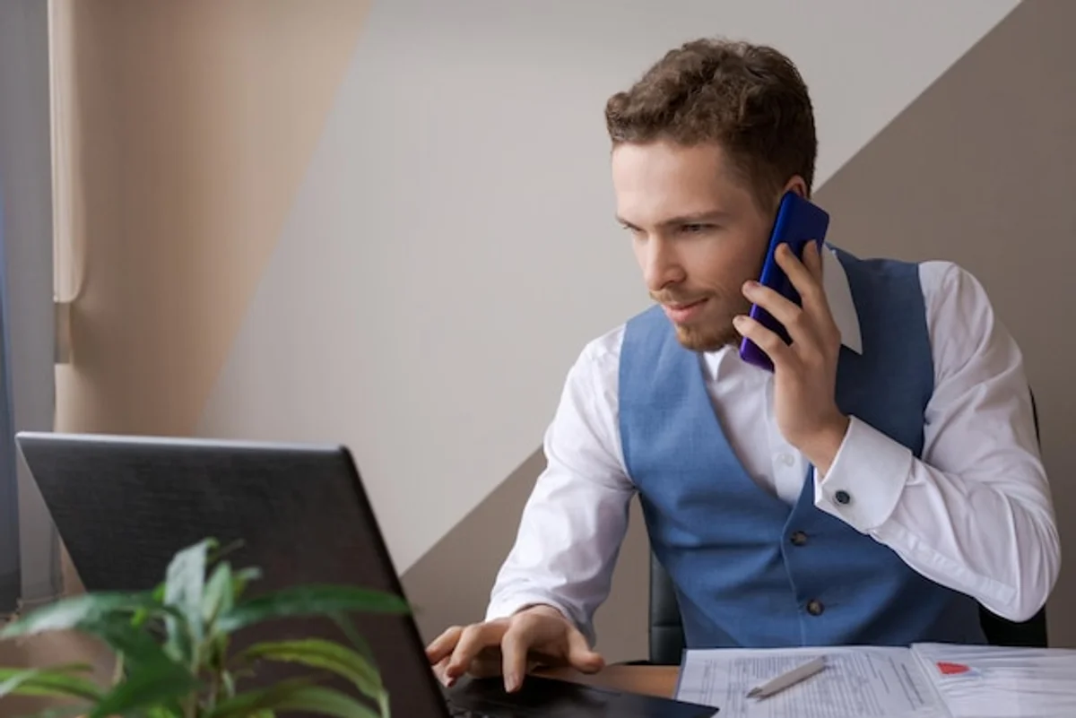 stressed business person checking email on laptop