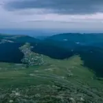 czech tourists using digital outdoor map in snowy mountains