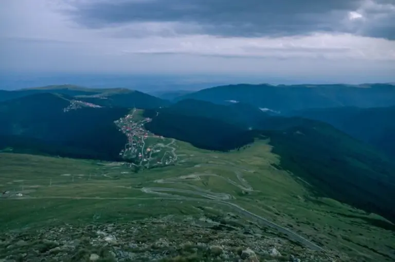 czech tourists using digital outdoor map in snowy mountains