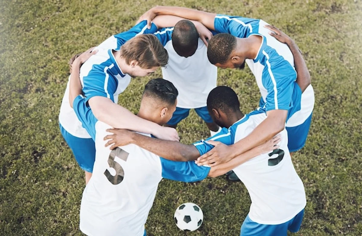 team huddle football young players motivation