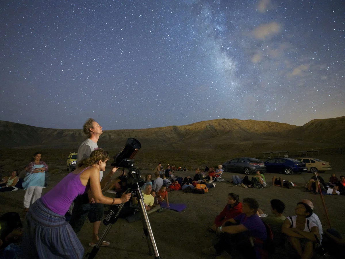 Czech family watching meteor shower with blankets and thermos