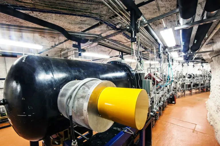 scientists working underground particle accelerator autumn mood