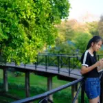 czech artist sketching autumn outdoors notepad colorful leaves city park